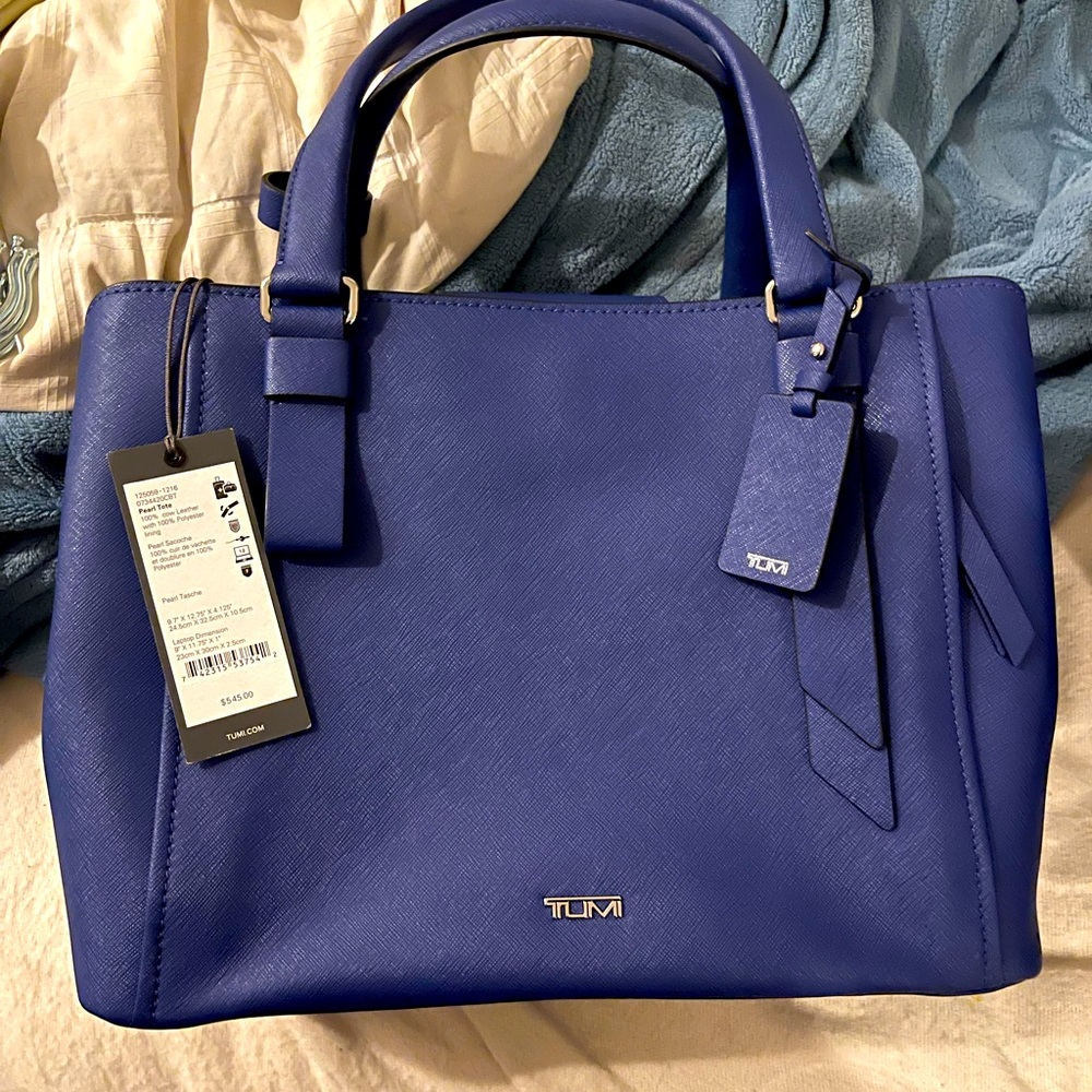 Tumi VAREK handbag in royal blue.